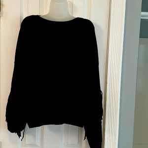 Aqua fringed sweater.